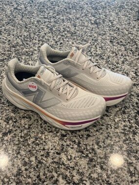 New Balance Women's Light Gray Running Shoes with Purple & Orange Accents
